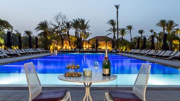2 outdoor pools, pool umbrellas, pool loungers