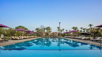 2 outdoor pools, pool umbrellas, pool loungers