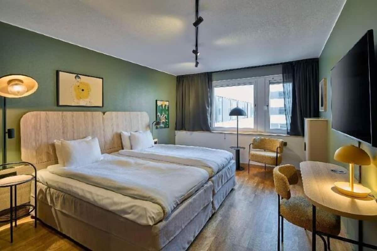 In-room safe, desk, blackout curtains, iron/ironing board