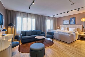 Junior Suite | 1 bedroom, in-room safe, desk, laptop workspace
