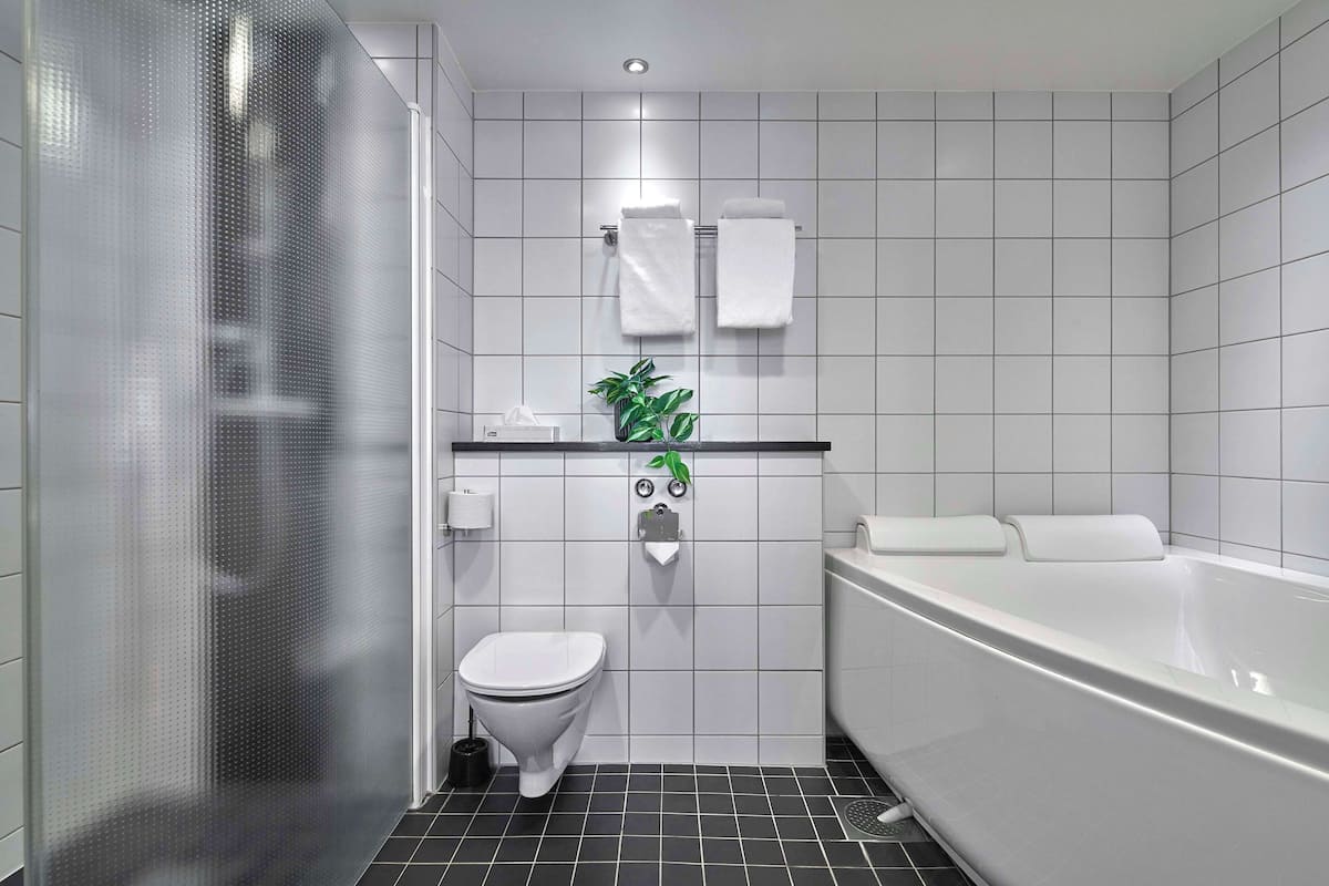 suite (master) | bathroom | combined shower/bathtub, hair dryer, heated floors, towels