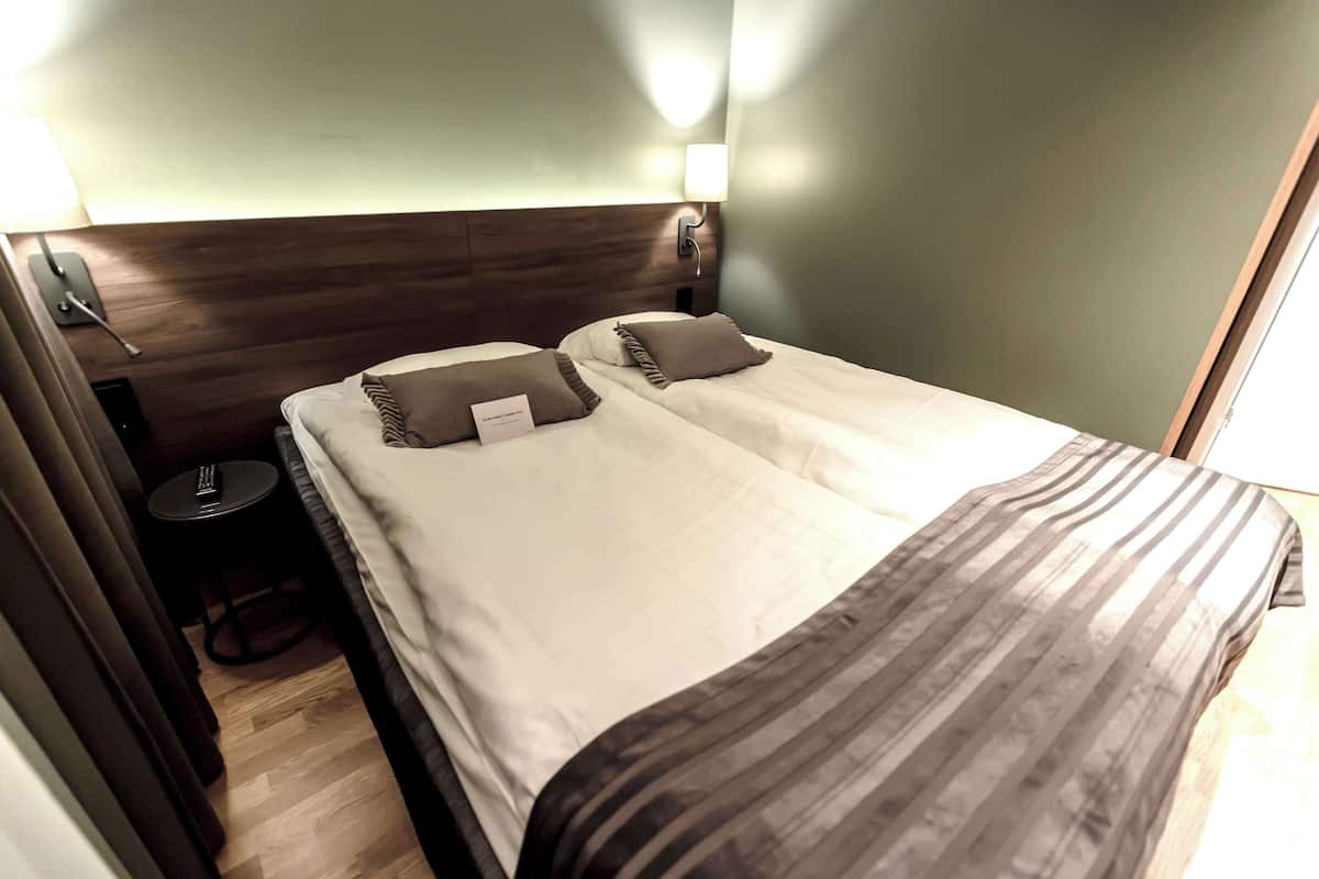 Double Room (No Window) | Desk, blackout drapes, iron/ironing board, free cribs/infant beds