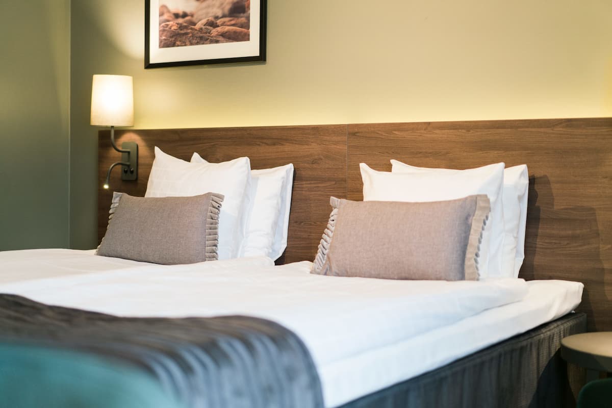 Double Room | Desk, blackout drapes, iron/ironing board, free cribs/infant beds