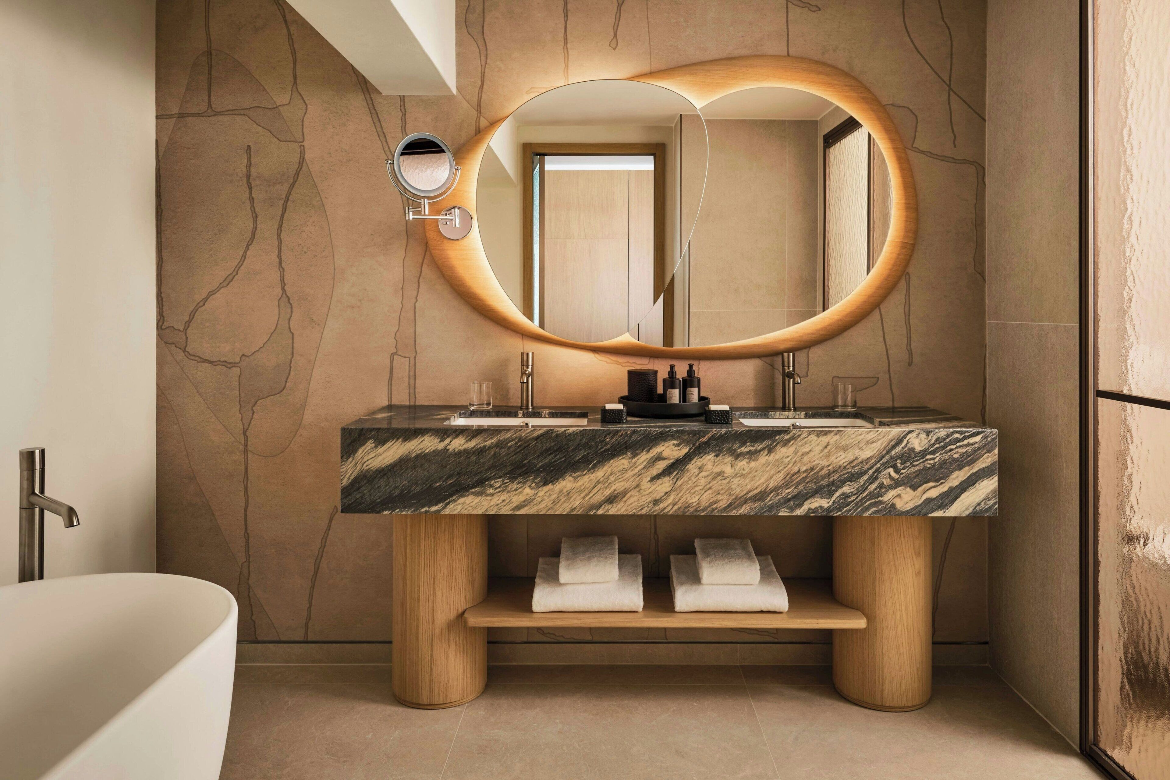 deluxe suite, 1 king bed, balcony | bathroom | free toiletries, hair dryer, bidet, towels