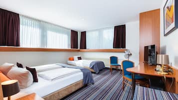 Standard Double or Twin Room | Minibar, desk, iron/ironing board, free cribs/infant beds