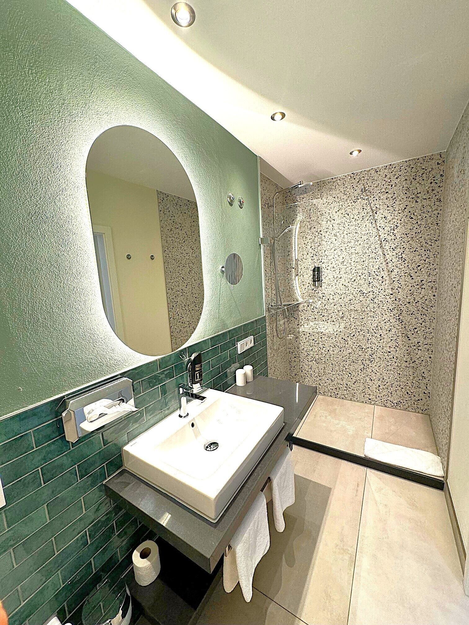 comfort double room | bathroom | eco-friendly toiletries, hair dryer, towels, soap