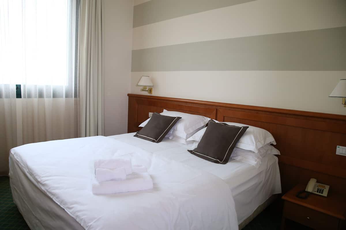 Down comforters, minibar, in-room safe, desk