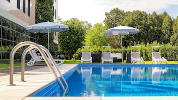 Seasonal outdoor pool, pool umbrellas, pool loungers