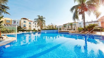Seasonal outdoor pool, pool umbrellas, sun loungers