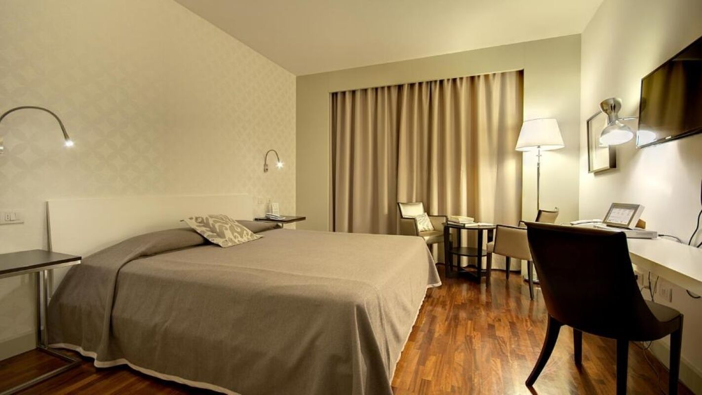 Hypo-allergenic bedding, pillow-top beds, minibar, in-room safe