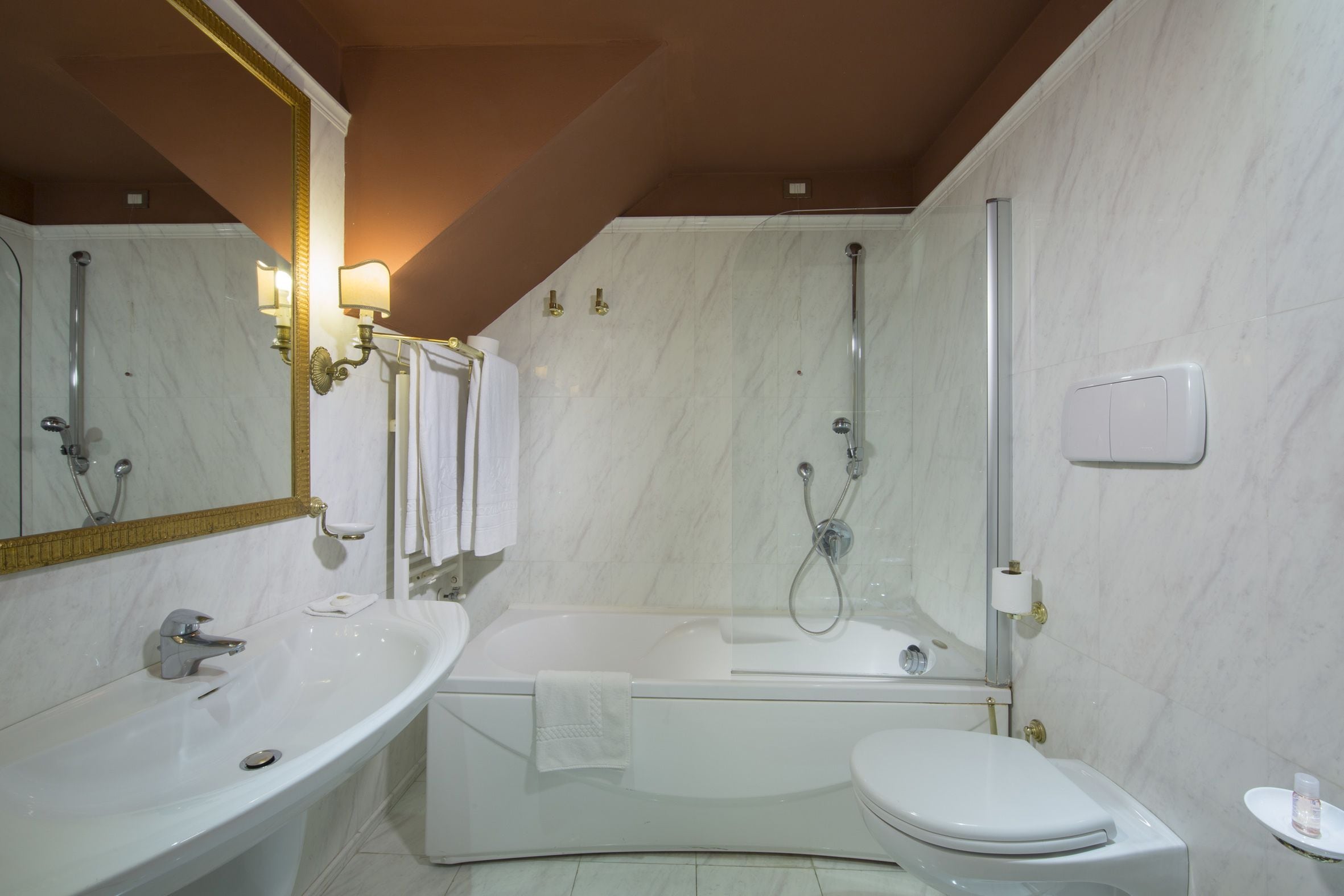 free toiletries, hair dryer, slippers, bidet