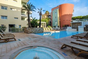 Seasonal outdoor pool, pool umbrellas, sun loungers