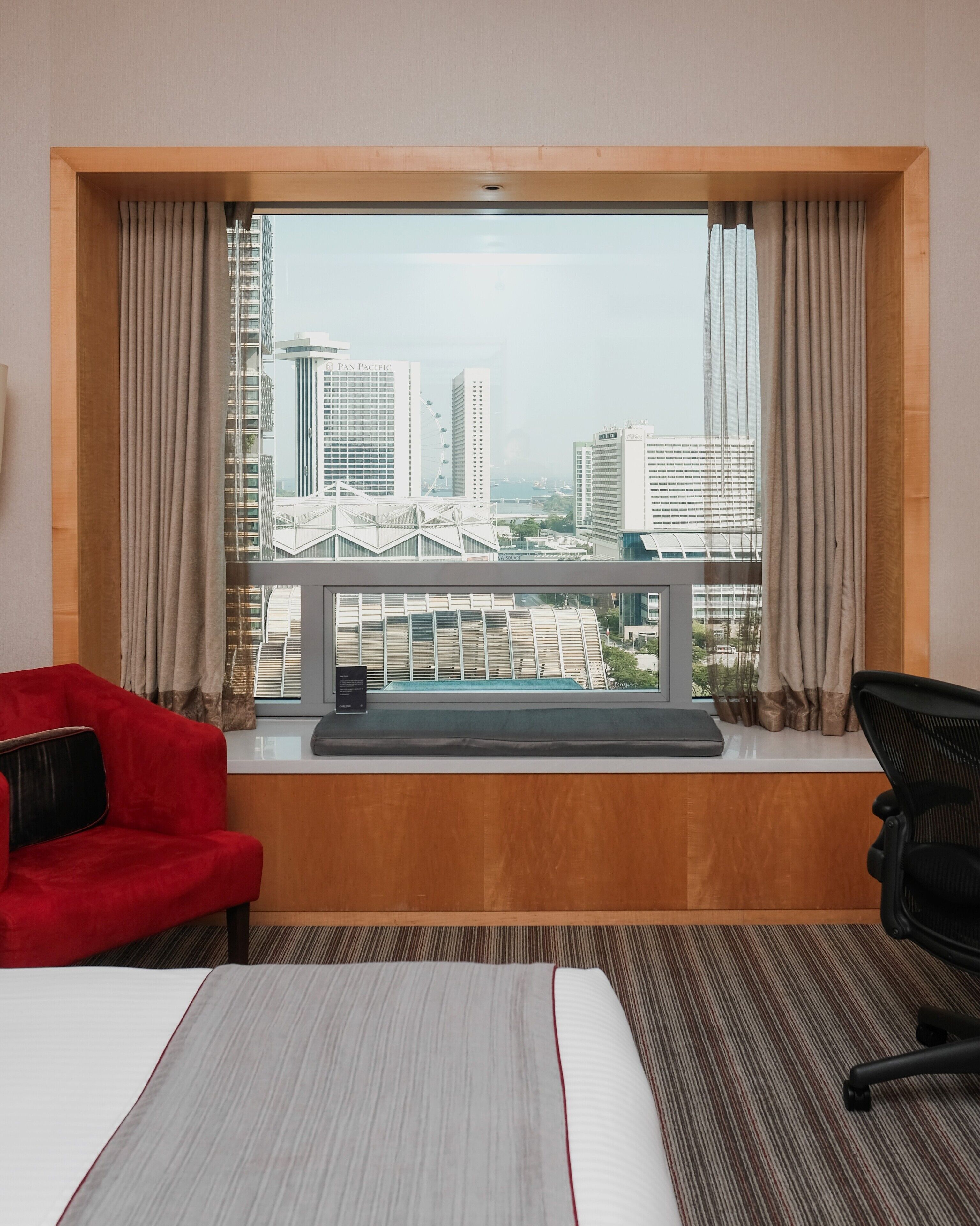 Premier Room | In-room safe, desk, laptop workspace, blackout drapes. Carlton Hotel Singapore