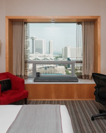 Premier Room | In-room safe, desk, laptop workspace, blackout drapes. Carlton Hotel Singapore