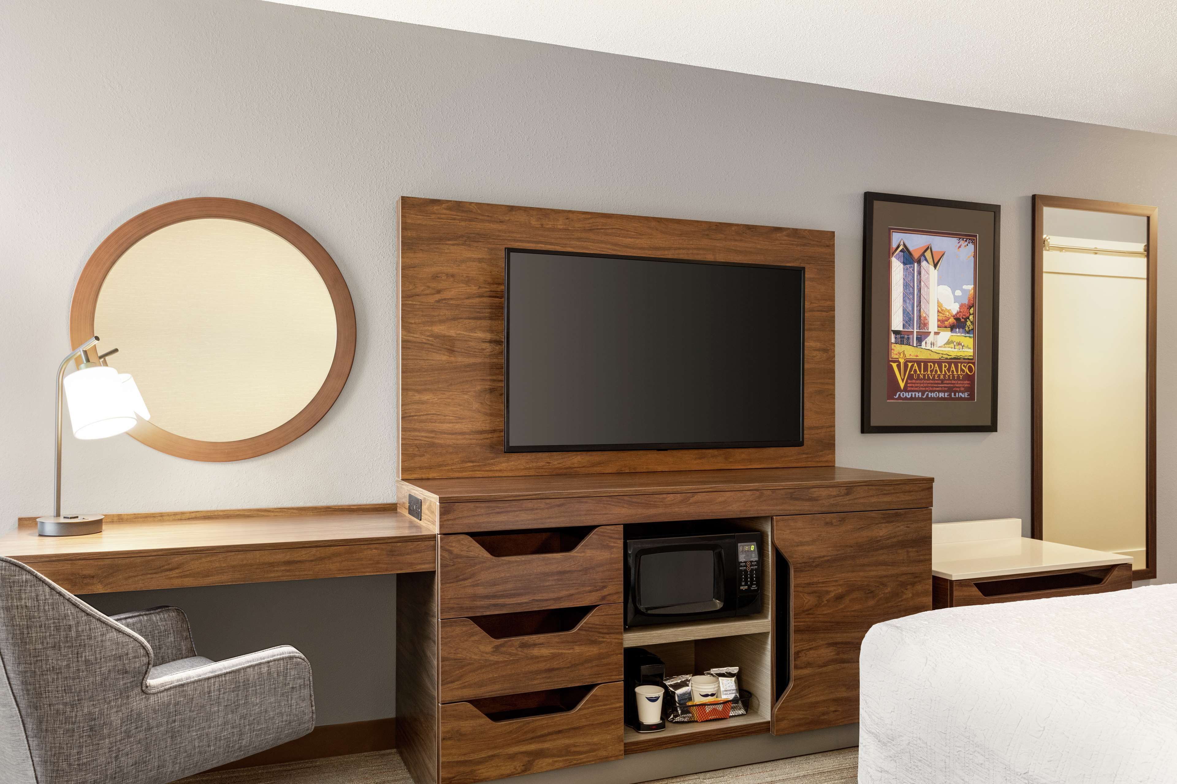 desk, laptop workspace, blackout curtains, iron/ironing board