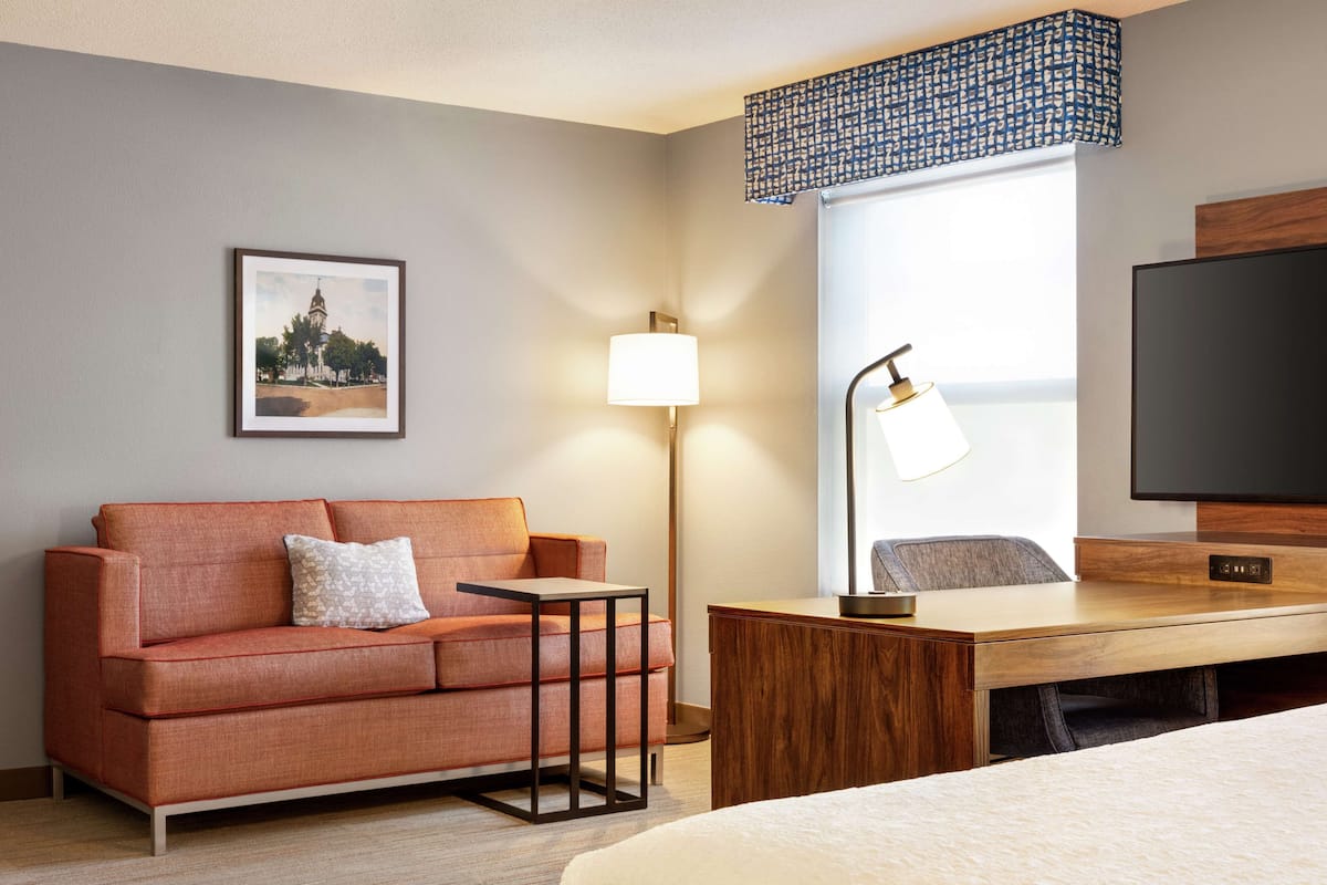 Desk, laptop workspace, blackout curtains, iron/ironing board