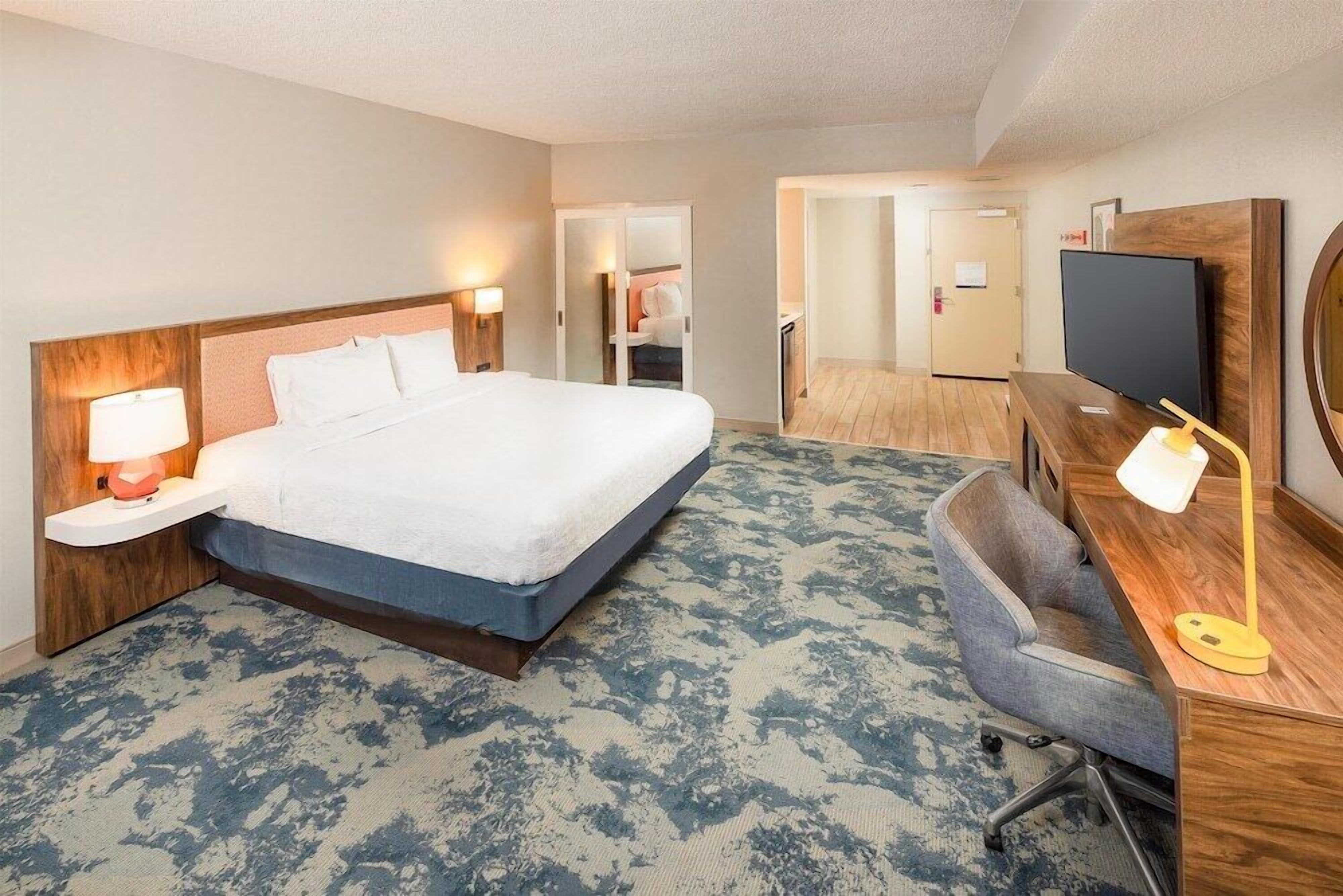 Hypo-allergenic bedding, pillow-top beds, in-room safe
