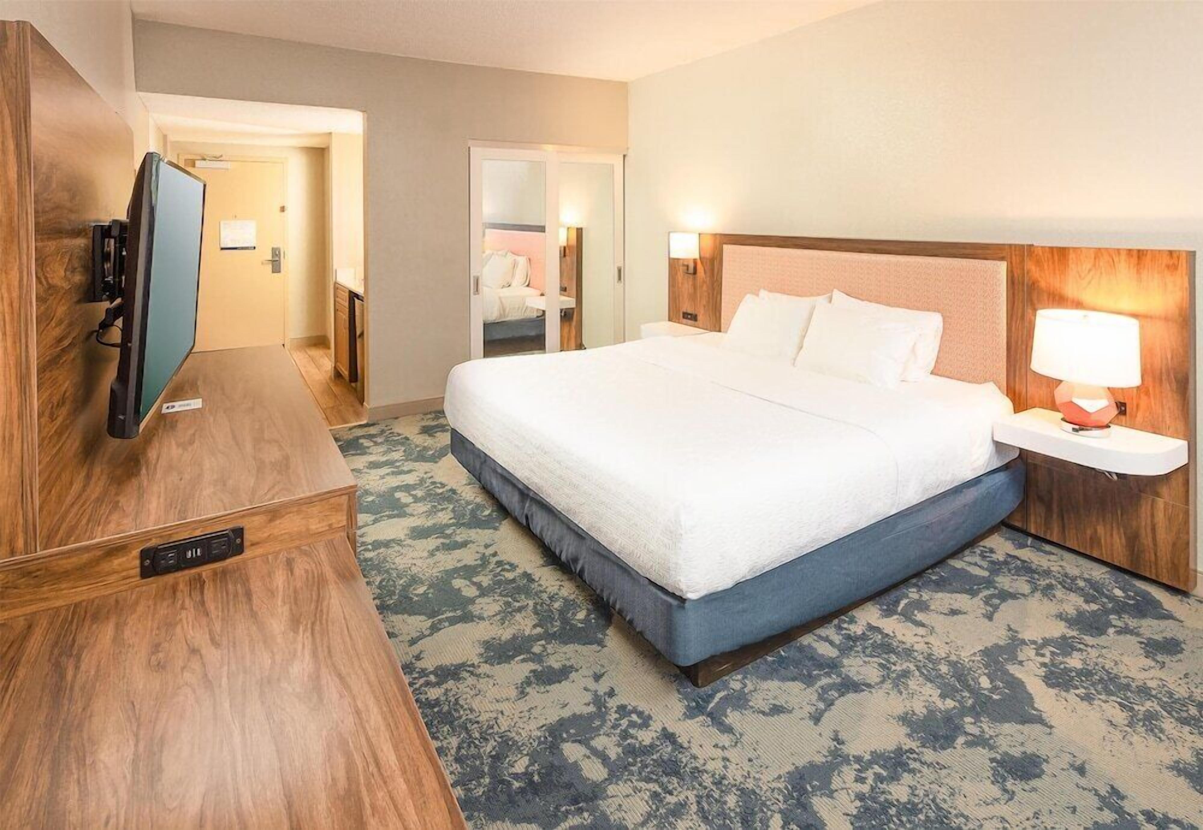 Hypo-allergenic bedding, pillow-top beds, in-room safe