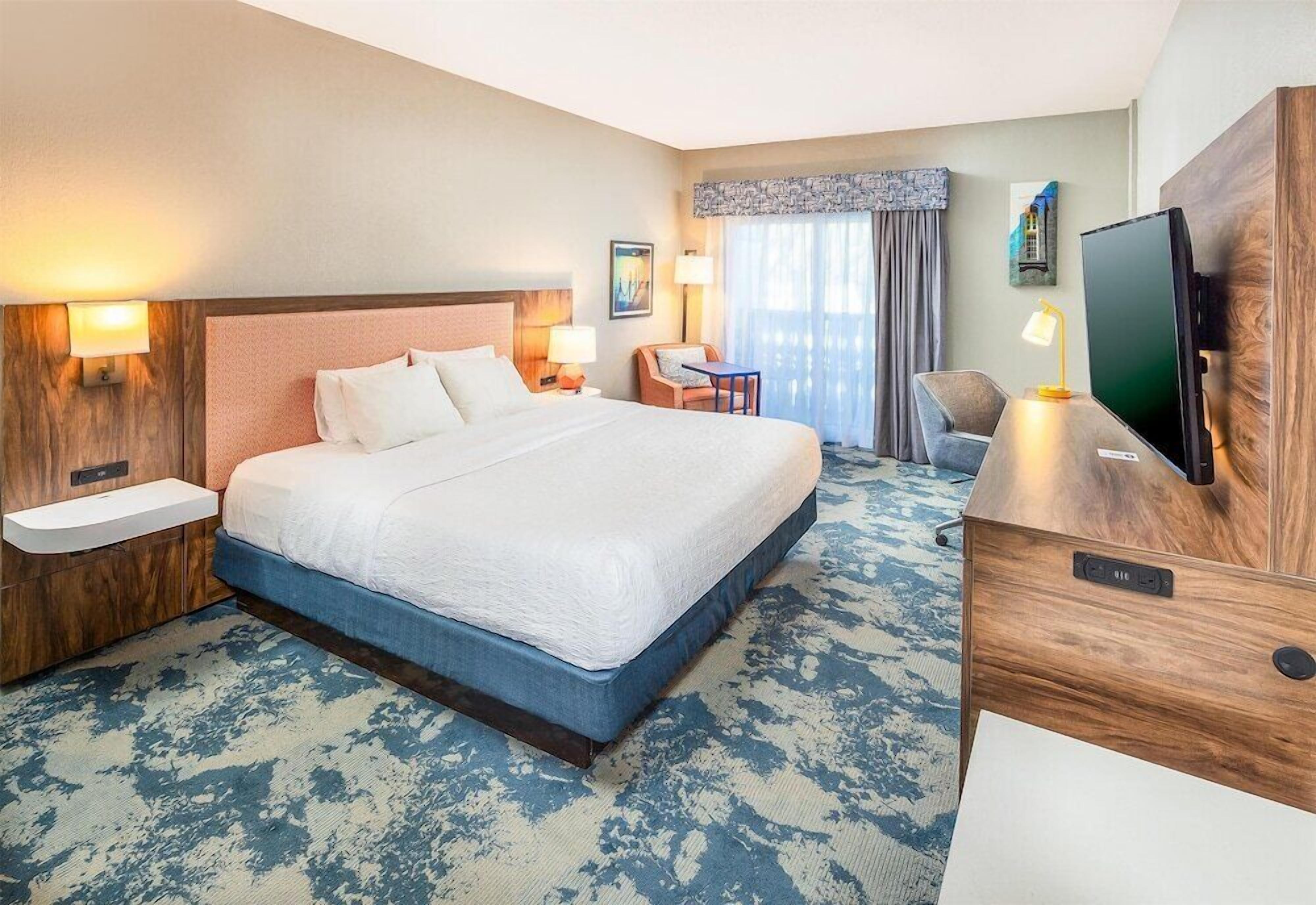Hypo-allergenic bedding, pillow-top beds, in-room safe