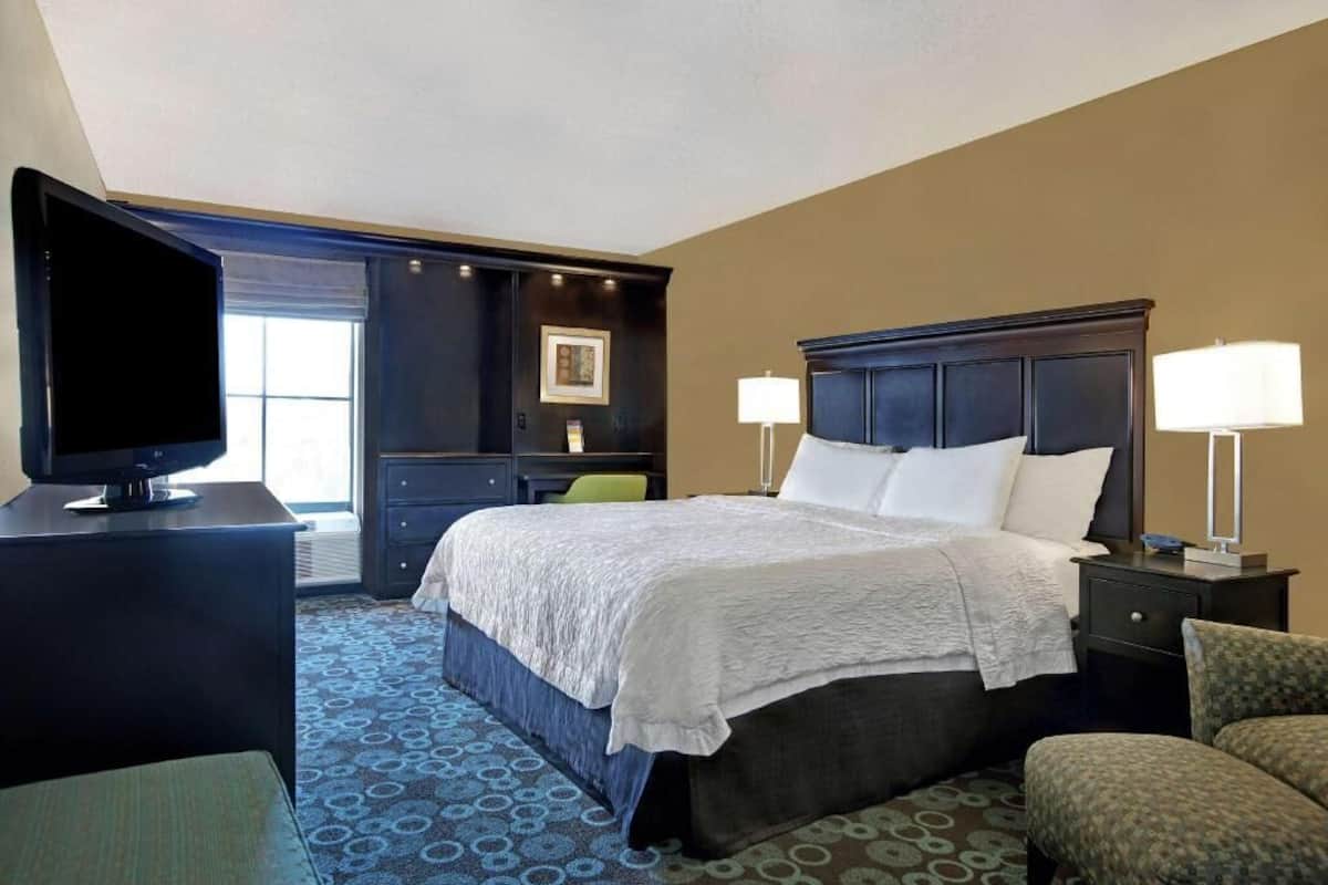 Desk, laptop workspace, blackout curtains, iron/ironing board