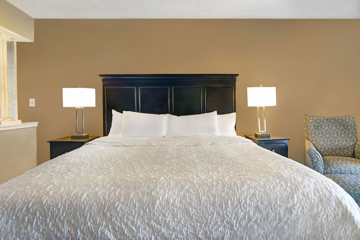 Desk, laptop workspace, blackout curtains, iron/ironing board