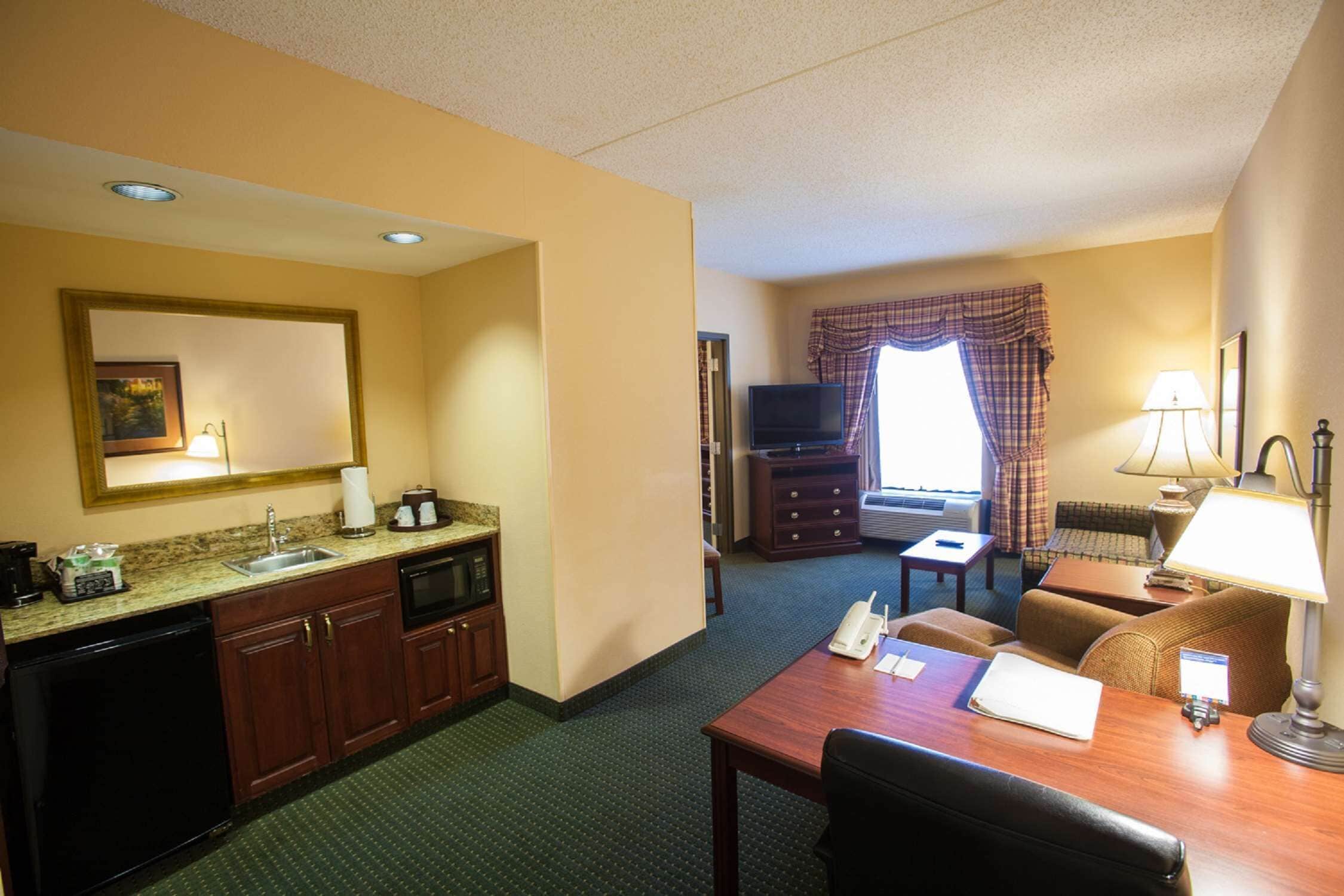 suite, 1 king bed, non smoking | premium bedding, in-room safe, free cots/infant beds, free wifi