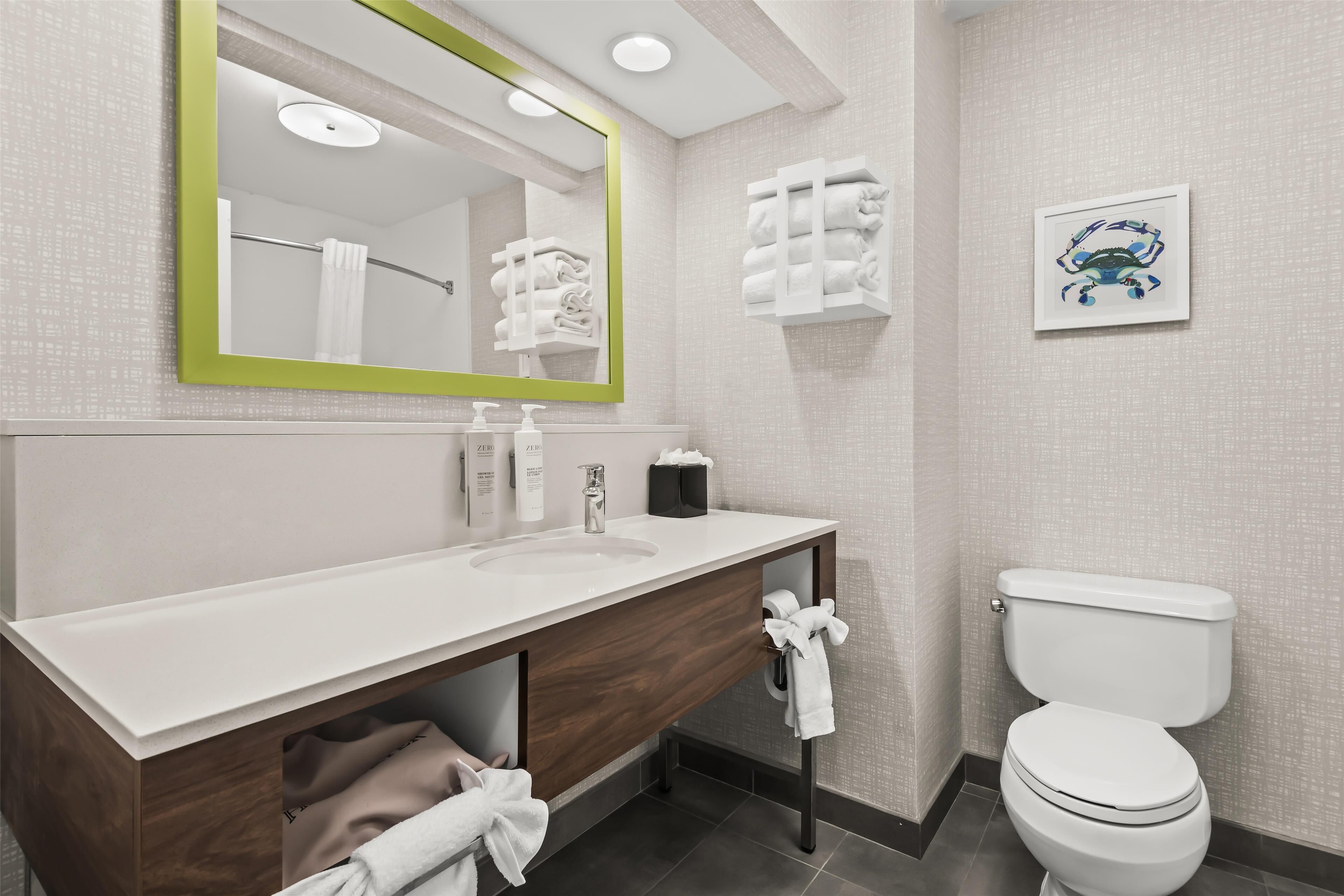 two queen beds non smoking | bathroom | designer toiletries, hair dryer, towels, soap