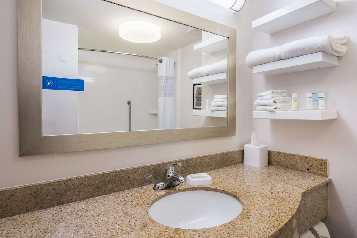 shower, hair dryer, bathrobes, towels