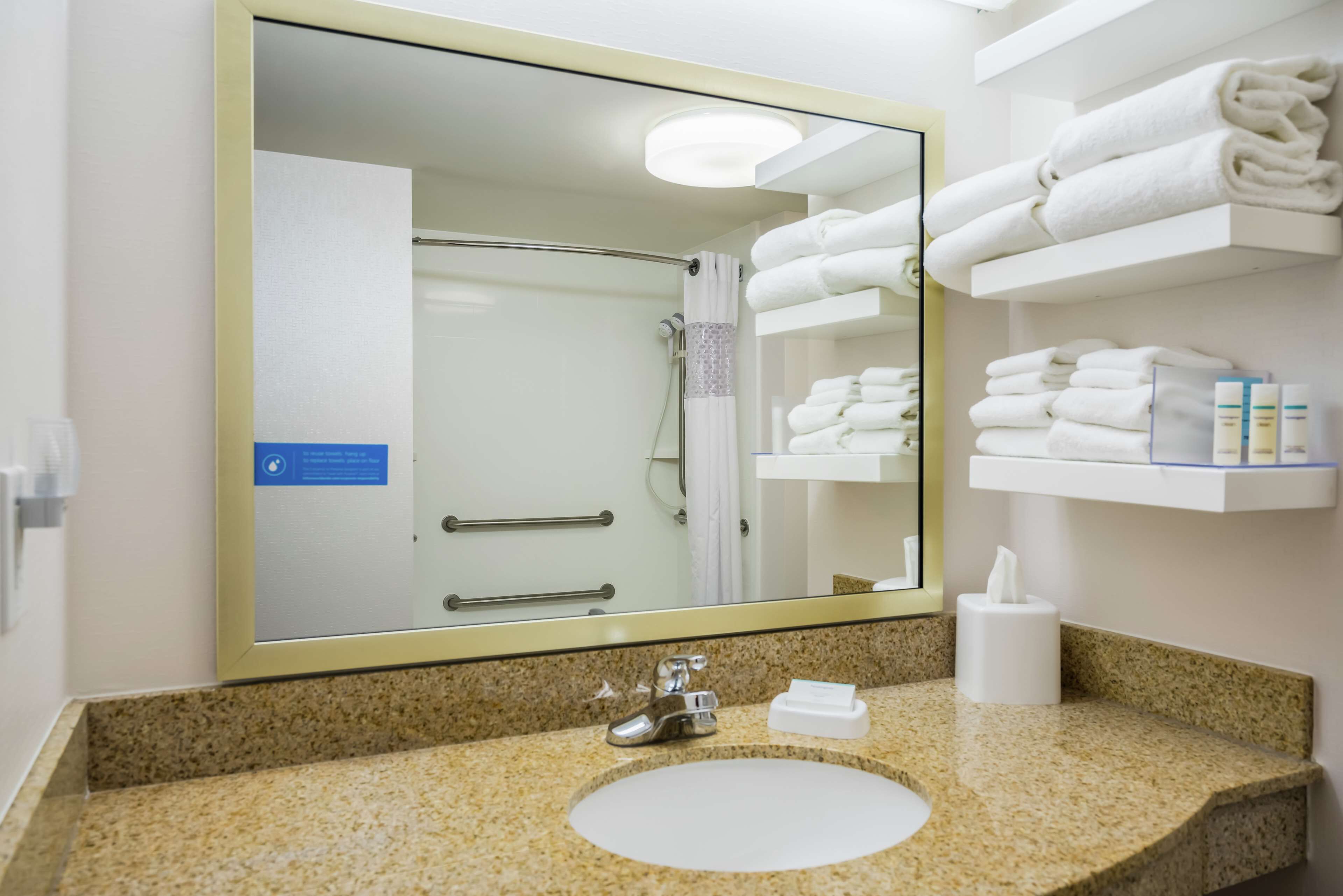 shower, hair dryer, bathrobes, towels