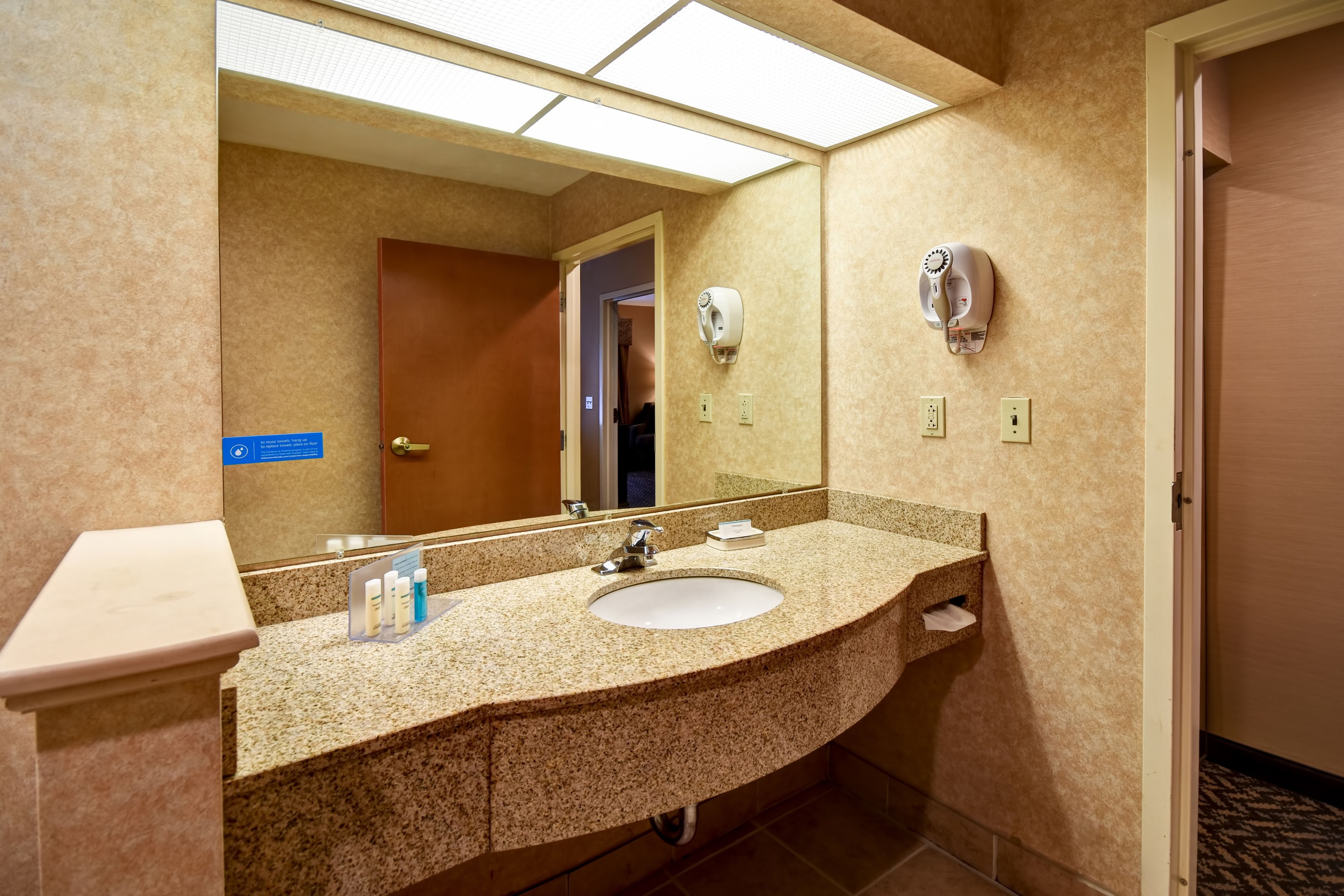 suite, 1 king bed, non smoking | bathroom | combined shower/bathtub, free toiletries, hair dryer, bathrobes