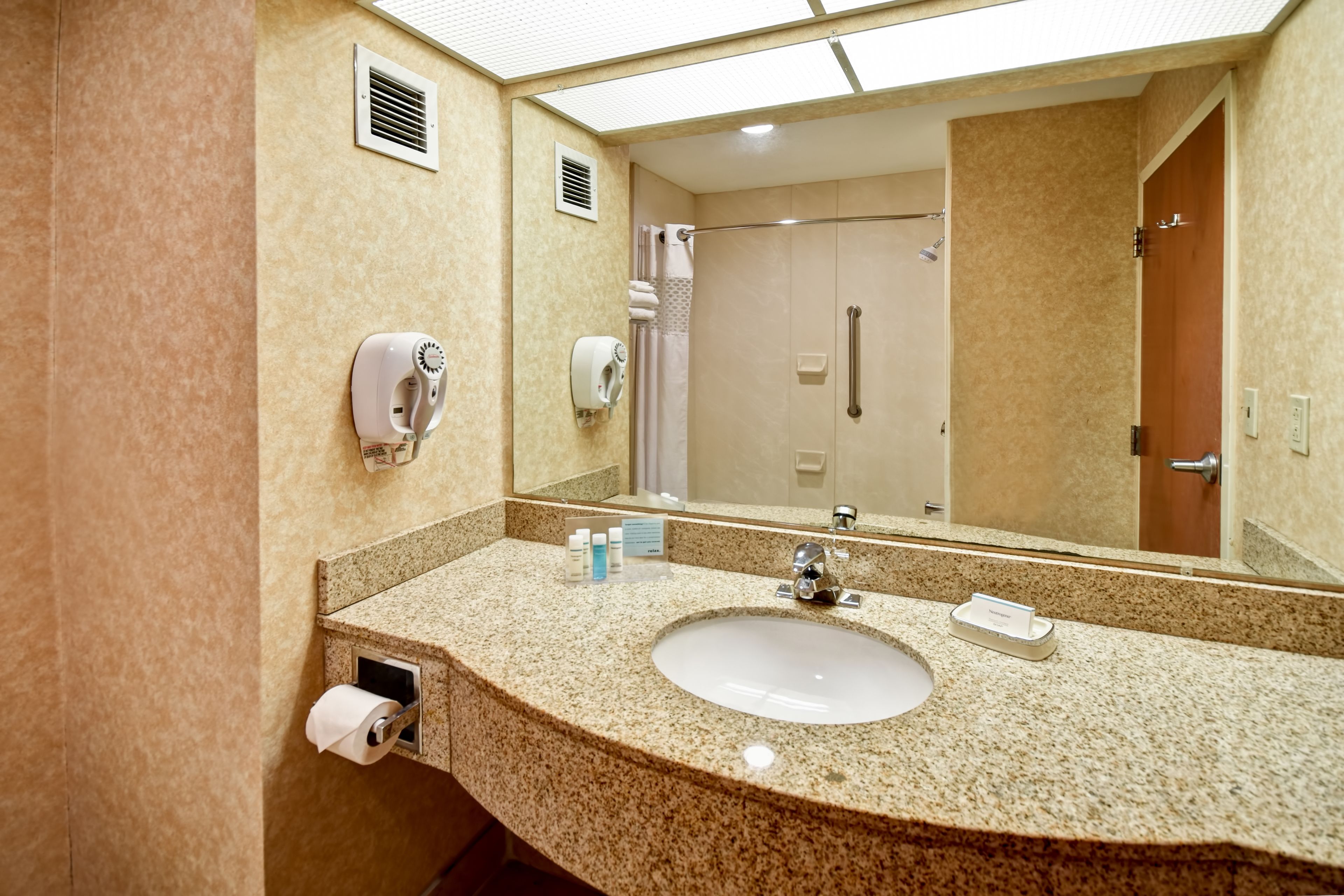 combined shower/bathtub, free toiletries, hair dryer, bathrobes