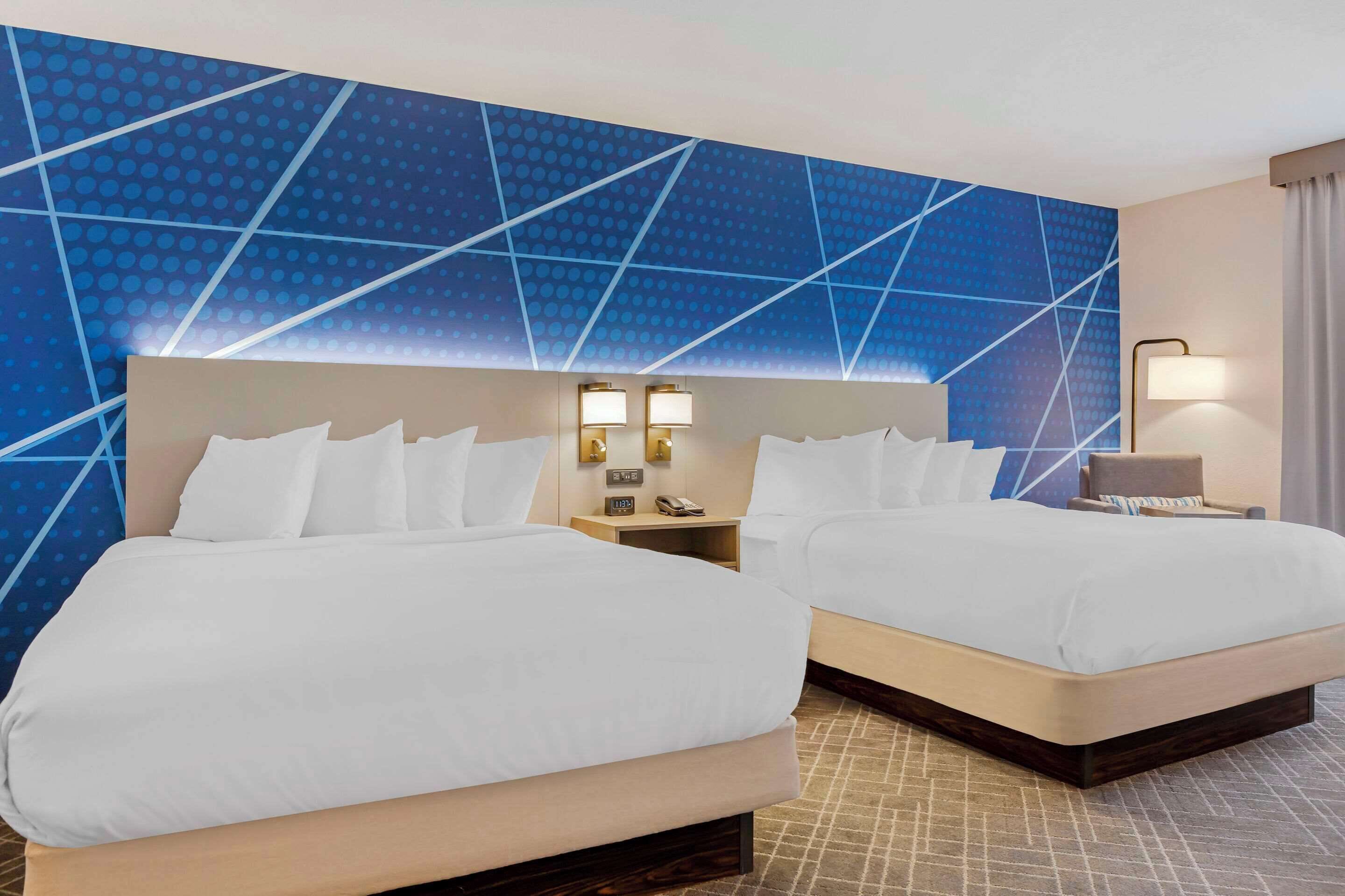 Suite, Multiple Beds, Non Smoking | Premium bedding, pillow-top beds, in-room safe, desk