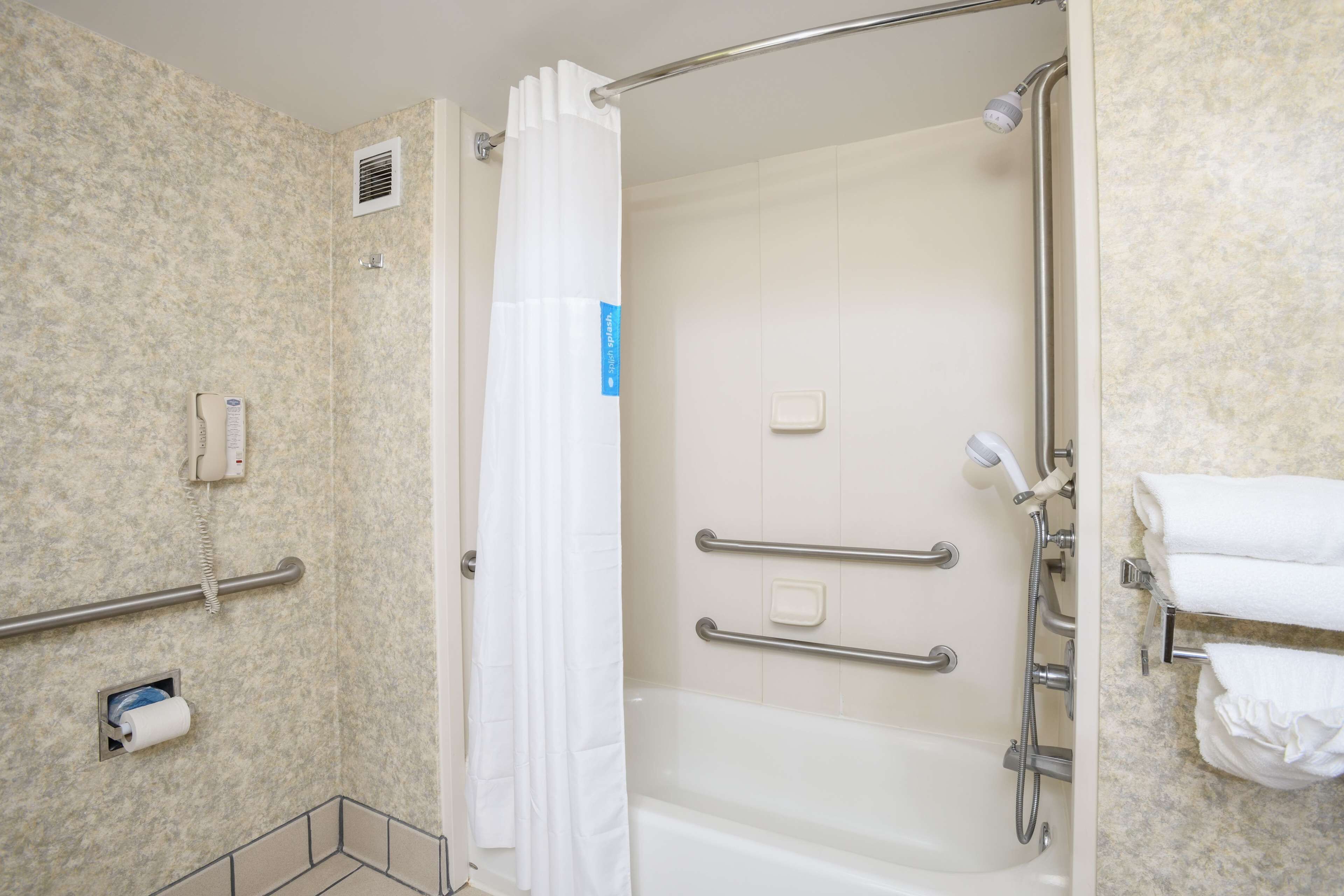 combined shower/bathtub, free toiletries, hair dryer, towels
