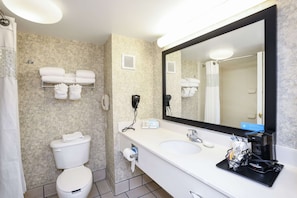 Room, 1 King Bed, Non Smoking | Bathroom | Combined shower/tub, free toiletries, hair dryer, towels