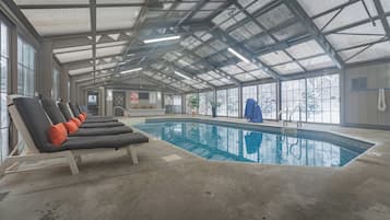 Indoor pool, open 8:00 AM to 10:00 PM, pool loungers