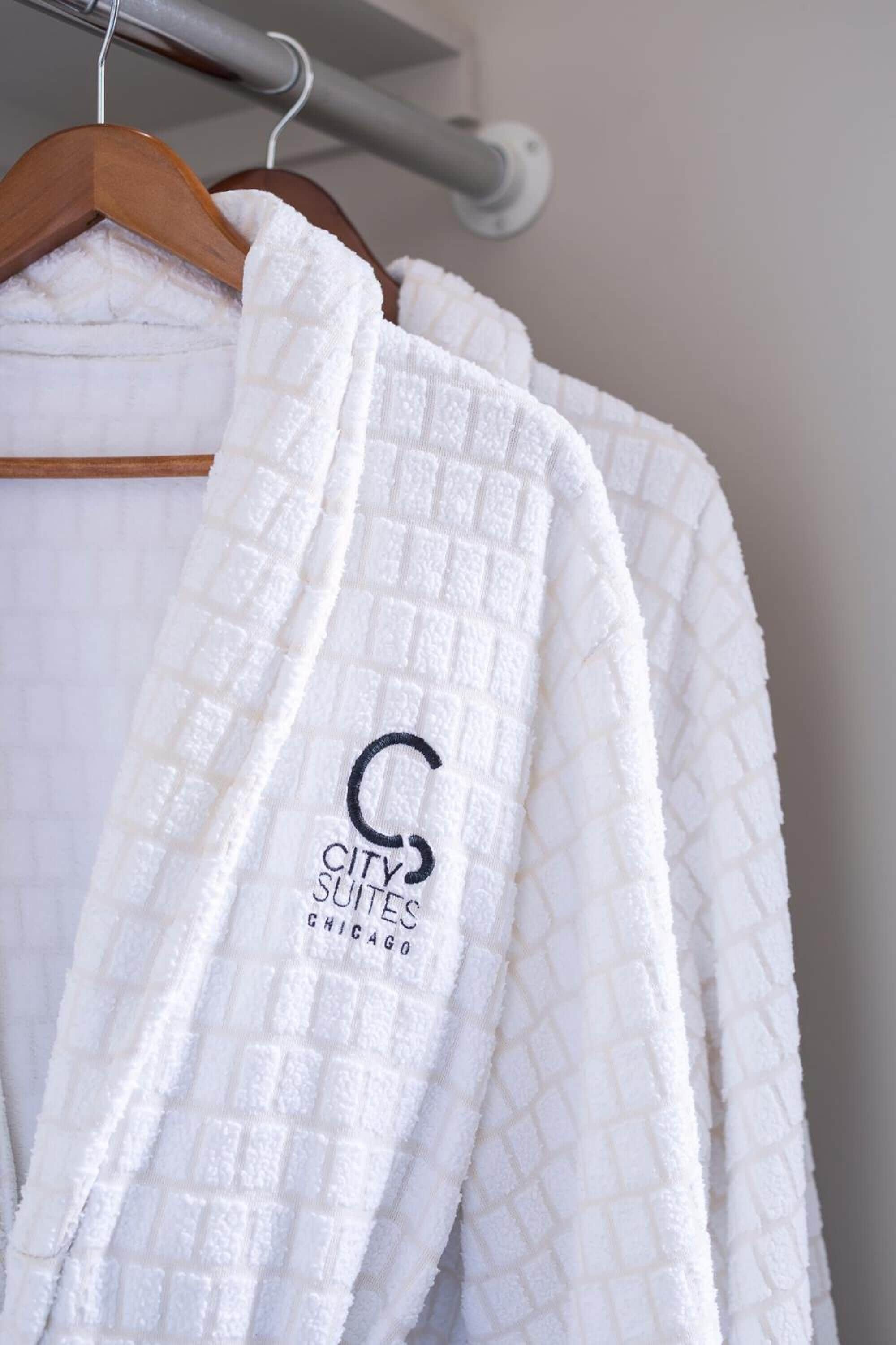 bathtub, designer toiletries, hair dryer, bathrobes