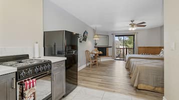 Standard Room, 2 Queen Beds, Fireplace (Kitchen) | Living area | TV, fireplace