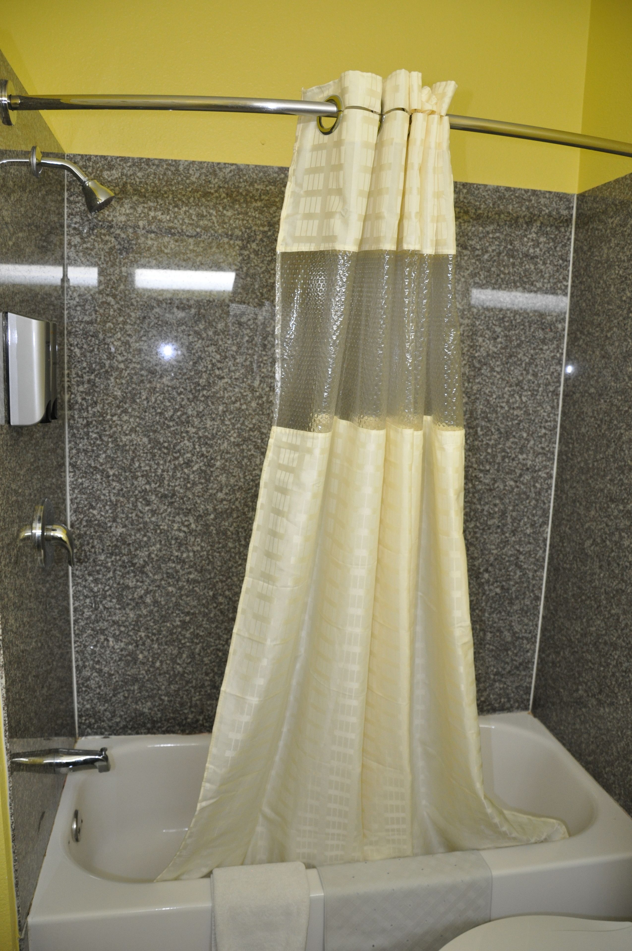 combined shower/bathtub, hair dryer, towels, soap