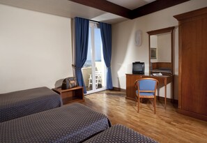 Triple Room (Beach services included) | Minibar, in-room safe, desk, laptop workspace