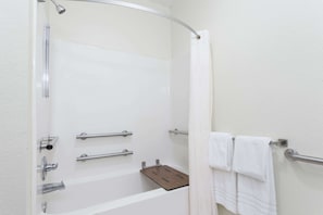Combined shower/tub, free toiletries, hair dryer, towels - Days Inn by Wyndham near Kansas Speedway (Kansas City)