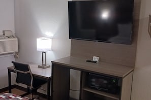 Desk, blackout curtains, free WiFi, bed sheets