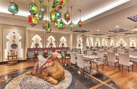 2 restaurants, breakfast, lunch, dinner served; Halal dishes