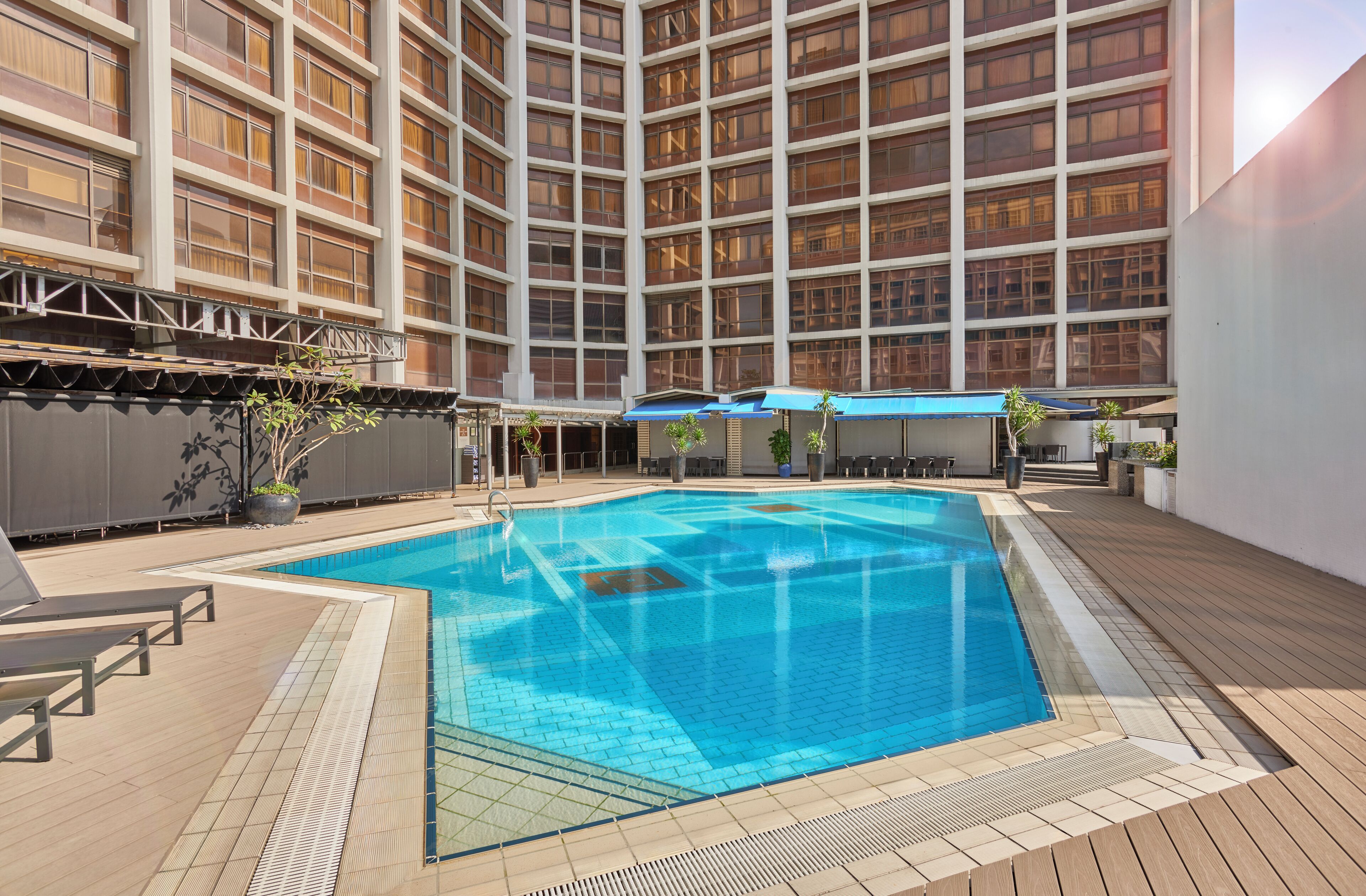 Outdoor pool, open 7:00 AM to 8:00 PM, pool umbrellas, pool loungers