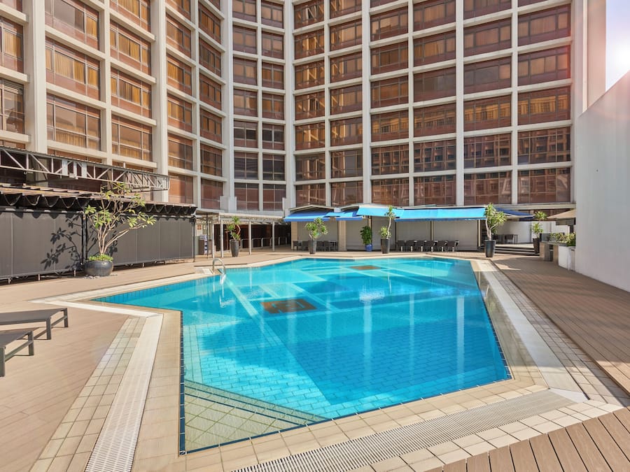 Outdoor pool, open 7:00 AM to 8:00 PM, pool umbrellas, pool loungers