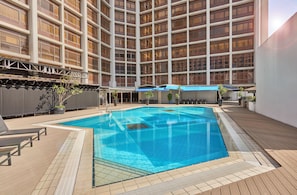 Outdoor pool, open 7:00 AM to 8:00 PM, pool umbrellas, sun loungers