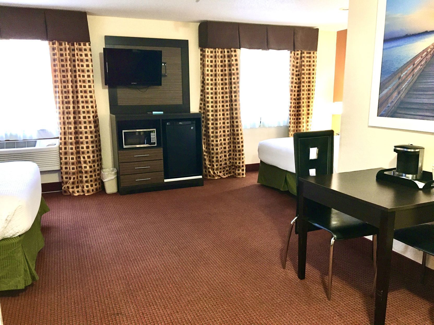 Desk, blackout curtains, iron/ironing board, rollaway beds