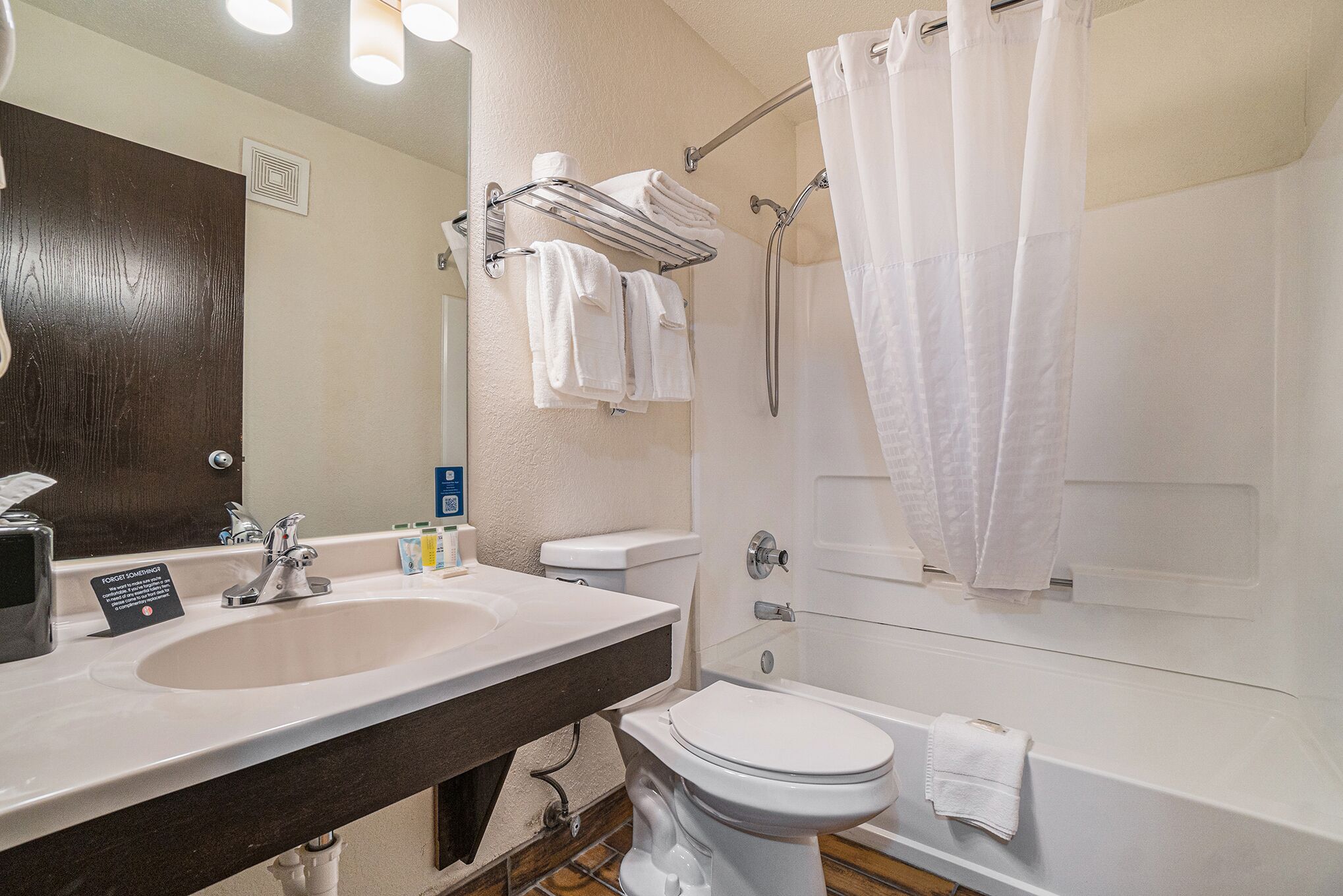 combined shower/bathtub, free toiletries, hair dryer, towels