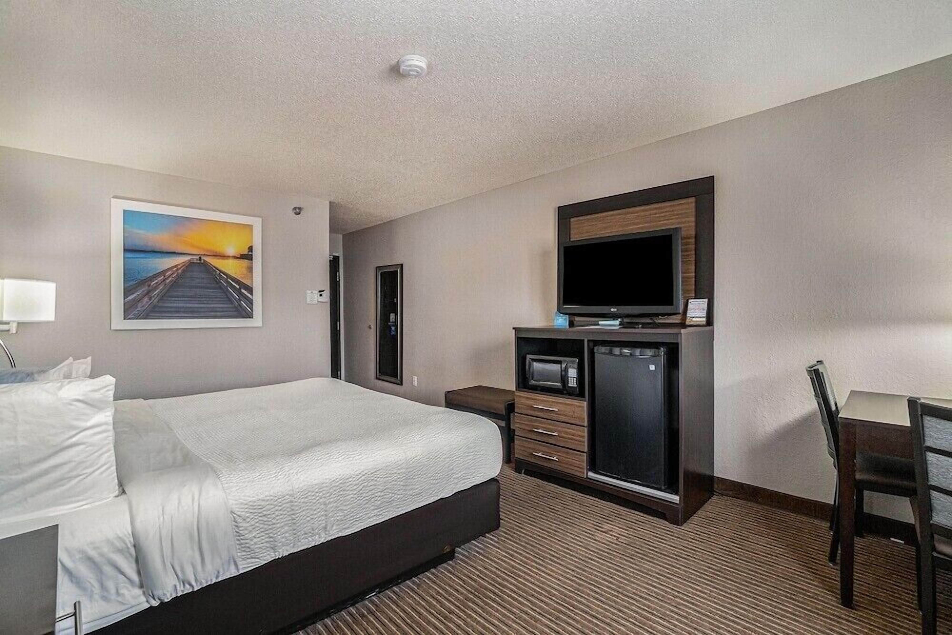Desk, blackout curtains, iron/ironing board, rollaway beds