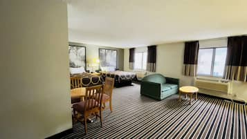 Suite, 2 Queen Beds | Desk, laptop workspace, blackout drapes, free WiFi