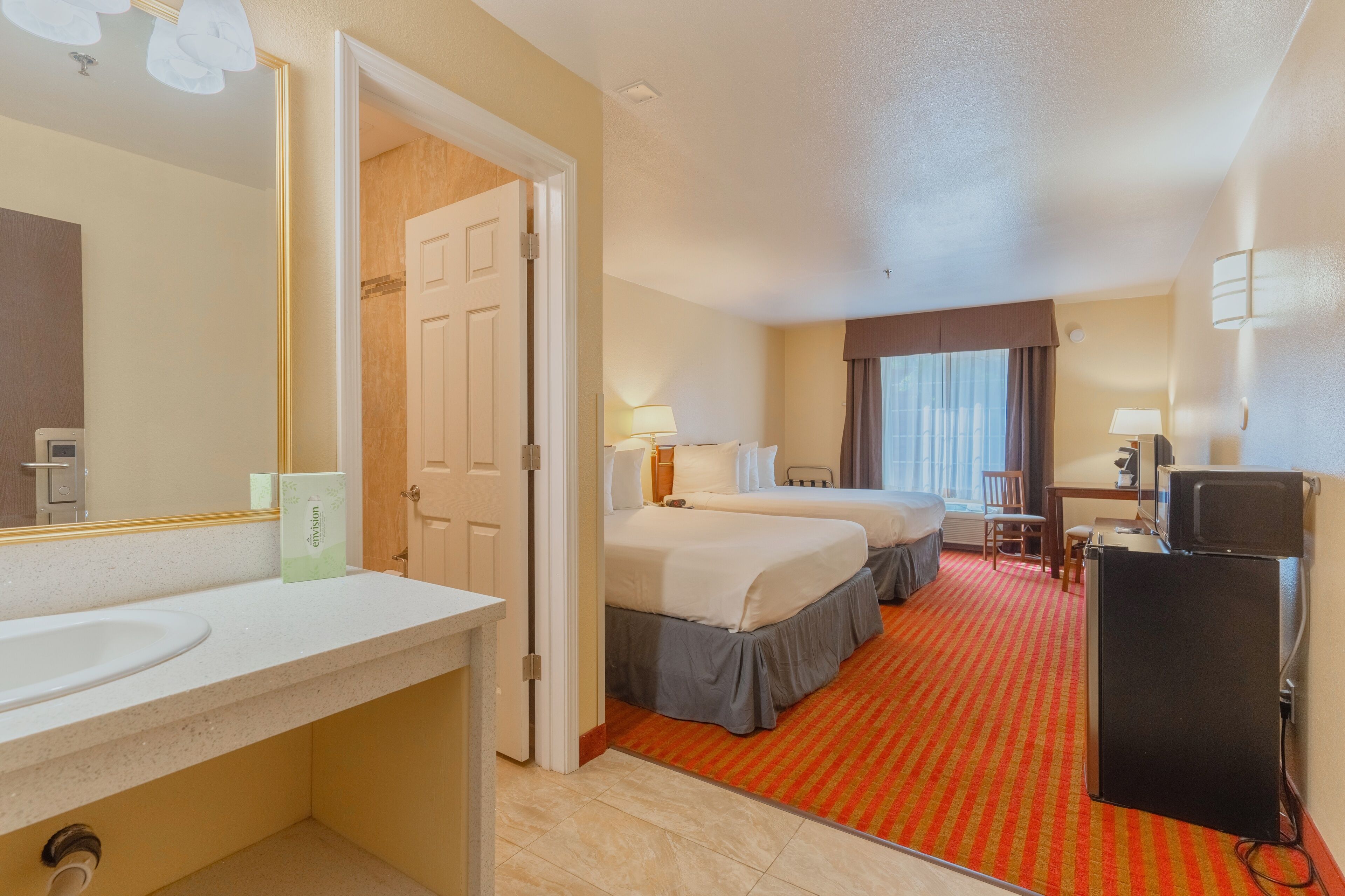 room, 2 queen beds | 1 bedroom, individually decorated, individually furnished, desk